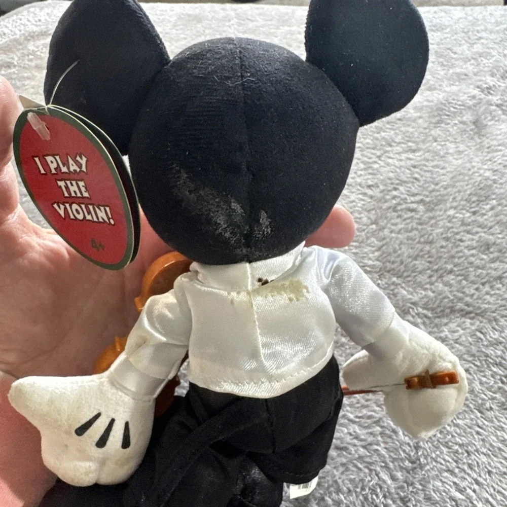 Mickey Mouse In A Tuxedo With A Violin Playing‎ A Violin
